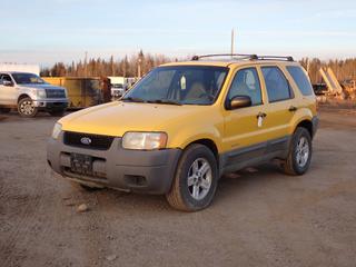 2001 Ford Escape XLS SUV c/w 2.0L, 5-Spd Manual, Power Sunroof And P235/70R16 Tires. Showing 301,789kms. VIN 1FMYU02B81KB84059 *Note: Drivers Side Rail Missing, Trans Shifter Requires Repairs, Needs Battery, Minor Rust* **Located In Fort McMurray**