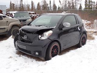 2012 Toyota Scion IQ 2-Door Coupe c/w 1.3L, A/T And 205/55R16 Tires. VIN JTNJJXB09CJ018059 *Note: Front Damaged, No Key, Running Condition Unknown, Buyer Responsible For Removal* **Located In Fort McMurray**