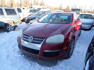 2006 Volkswagen Jetta 4-Door Sedan c/w 2.5L, 5-Cyl, A/T, Power Sunroof And 205/55R16 Tires. VIN 3VWDF71K26M607691 *Note: Minor Rust, No Keys, Running Condition Unknown, Buyer Responsible For Removal* **Located In Fort McMurray**