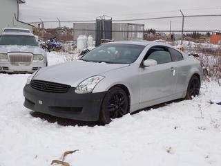 2006 Infiniti G35 2-Door Sedan c/w 3.5L, A/T, Power Sunroof And 225/40R18 Tires. Showing 293,554kms. VIN JNKCV54E56M716653 *Note: Windshield Cracked, No Key, Running Condition Unknown, Buyer Responsible For Removal* **Located In Fort McMurray**