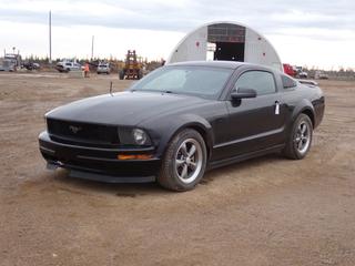2005 Ford Mustang c/w 4.0L, 5-Spd Manual And 235/55R17 Tires. Showing 304,165kms. VIN 1ZVFT80N955211930 *Note: Rear Quarter Panel Driver Side In Front Of Tire Damaged* **Located In Fort McMurray**