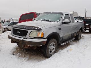2003 Ford F150 XLT 4X4 Extended Cab Pickup c/w 5.4L Triton V8, A/T, Tonneau Cover And P265/70R17 Tires. VIN 2FTRX18L93CA81827 *Note: Previously Registered In Saskatchewan, Rust, Ignition Doesn't Turn, Unable To Verify Mileage, Running Condition Unknown, Buyer Responsible For Removal* **Located In Fort McMurray**