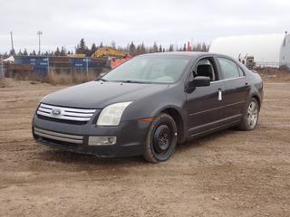 2007 Ford Fusion 4-Door Sedan c/w 3.0L, 4-Cyl  Engine, A/T, Power Sunroof And 225/50R17 Tires. Showing 270,611kms. VIN 3FAHP02137R231673 *Note: Scratches Throughout Body, Dent In Passenger Back Quarter Panel, Engine Light On, Driver Side Window Broken* **Located In Fort McMurray**