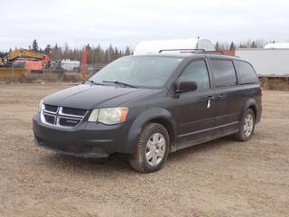 2011 Dodge Grand Caravan c/w 3.6L V6 VVT Gas, A/T And 225/65R16 Tires. Showing 332,868kms. VIN 2D4RN4DGXBR773898 *Note: Windshield Cracked, Driver Door Panel Switch Missing, Minor Rust, Dent In Passenger Door, Engine And Traction Light On, No Reverse* **Located In Fort McMurray**