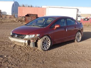 2009 Honda Civic SI 4-Door Sedan c/w 2.0L, 5-Spd Manual, Power Sunroof And 225/40R18 Tires. Showing 324,737kms. VIN 2HGFA55559H200438 *Note: Front Bumper Missing* **Located In Fort McMurray**