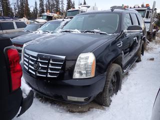2007 Cadillac Escalade 4X4 SUV c/w 6.2L Vortec, A/T, Power Sunroof And 305/45R22 Tires. Showing 262,253kms. VIN 1GYFK638X7R148682 *Note: Passenger Side Door Handle Missing, Minor Rust, Rear Wiper Missing, Running Condition Unknown* **Located In Fort McMurray**