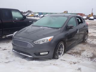 2015 Ford Focus SE 4-Door Hatchback c/w 2.0L, 4-Cyl, A/T, Power Sunroof And 205/50ZR17 Tires. VIN 1FADP3K26FL330736 *Note: Rear Driver Windows Smashed, No Key, Running Condition Unknown, Buyer Responsible For Removal* **Located In Fort McMurray**