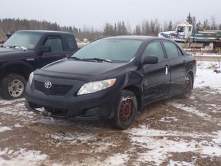 2009 Toyota Corolla CE 4-Door Sedan c/w 1.8L, A/T And 195/65R15 Tires. VIN 2T1BU40E59C032512 *Note: Driver Front Fender And Front Bumper Damaged, Previously Registered In Saskatchewan, No Keys, Running Condition Unknown, Buyer Responsible For Removal* **Located In Fort McMurray**