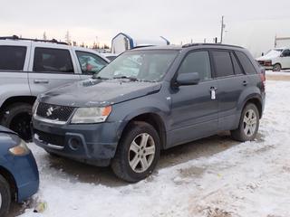 2007 Suzuki Grand Vitara 4X4 SUV c/w 2.7L, V6, A/T, Leather, Power Sunroof And 225/65R17 Tires. VIN JS3TD947374201070 *Note: Back Tail Light And Fender Damage, Front Bumper Damage, Minor Rust, No Keys, Running Condition Unknown, Buyer Responsible For Removal* **Located In Fort McMurray**
