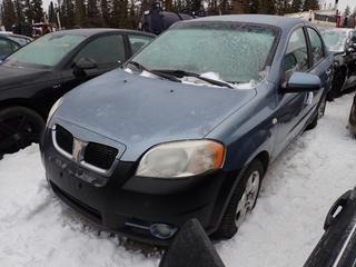 2008 Pontiac Wave 4-Door Sedan c/w 1.6L E-Tec II, 5-Spd Manual, Power Sunroof And 195/55R15 Tires. VIN KL2TW55618B009590 *Note: Minor Rust, Windshield Cracked, No Key, Running Condition Unknown, Buyer Responsible For Removal* **Located In Fort McMurray**