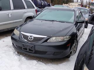 2004 Mazda 6 4-Door Sedan c/w 3.0L, 4-Cyl, A/T And 205/50R17 Tires. VIN 1YVHP84D745N69702 *Note: Scratches On Passenger Side, Front Fender Damaged, No Keys, Running Condition Unknown, Buyer Responsible For Removal* **Located In Fort McMurray**