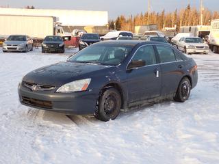 2003 Honda Accord 4-Door Sedan c/w 2.4L I-Vtec, A/T And 195/65R15 Tires. Showing 299,590kms. VIN 1HGCM56483A817239 *Note: Rust Spots, Engine And ABS Light On* **Located In Fort McMurray**