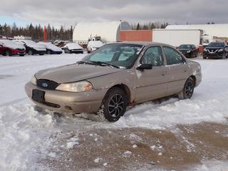 1998 Ford Contour 4-Door Sedan c/w 2.0L And 185/70R14 Tires. Showing 277,016kms/ VIN 1FALP653XWK146312 *Note: Windshield Cracked, Rust Spots, Scratches, Heater/AC Does Not Work* **Located In Fort McMurray**
