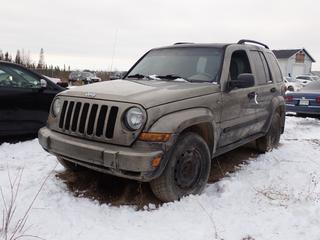 2005 Jeep Liberty 4X4 SUV c/w 3.7L V6, A/T, Power Sunroof And 225/75R16 Tires. Showing 296,370kms. VIN 1J4GL38K95W668665 *Note: Windshield Cracked, No Key, Running Condition Unknown, Buyer Responsible For Removal* **Located In Fort McMurray**