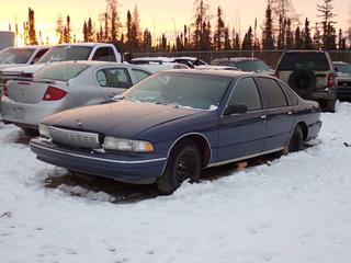 1996 Chevrolet Caprice 4-Door Sedan c/w 4.3L, A/T And P225/75R15 Tires. VIN 1G1BL52WXTR139057 *Note: Hook Latch Broken, Previously Registered In Saskatchewan, Ignition Damaged, No Key, Buyer Responsible For Removal* **Located In Fort McMurray**