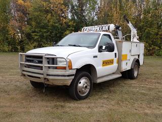 1999 Ford F450 Super Duty 4X4 Service Truck c/w 7.3L Diesel, 5-Spd Manual Transmission, 9ft X 90in Service/Utility Truck Body, Auto Crane, Air Tank, Vise, Toolboxes, Pump And 225/70R19.5 Tires. Showing 179,010kms. VIN 1FDXF47F6XEB57300 *Note: Has Salvage Title* **Located In Edmonton**