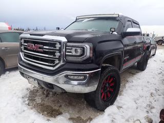 2018 GMC Sierra SLT 4X4 Crew Cab Pickup c/w 5.3L, A/T, Power Sunroof, Tonneau Cover And 35X12.50R20 Tires. Showing 111,848kms. VIN 3GTU2NEC3JG503367 *Note: Previously Registered In British Columbia, No Key, Running Condition Unknown, Buyer Responsible For Removal* **Located In Fort McMurray**