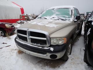 2004 Dodge Ram 1500 4X4 Quad Cab Pickup c/w 4.7L V8 Magnum, A/T And 265/70R17 Tires. Showing 301,625kms. VIN 1D7HU18N64J245260 *Note: Windshield Cracked, Rust Throughout Body, No Response From Ignition To Key When Trying To Start, Running Condition Unknown, Buyer Responsible For Removal* **Located In Fort McMurray**