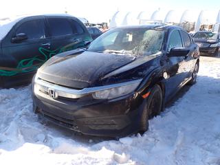 2016 Honda Civic 4-Door Sedan c/w 2.0L, A/T And 215/55R16 Tires. VIN 2HGFC2F50GH003830 *Note: Windshield Cracked, Scrape On Back Drivers Side Door, Door Handle Broken, No Key, Running Condition Unknown, Buyer Responsible For Removal* **Located In Fort McMurray**