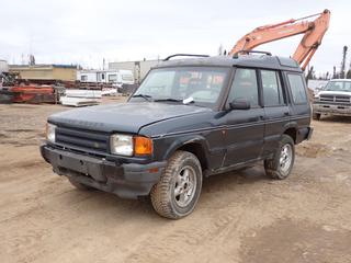 1996 Land Rover Discovery SUV c/w 4.0L V6, A/T And 235/70R16 Tires. Showing 304,371kms. VIN SALJY1249TA193176 *Note: Windshield Cracked, Minor Rust, Missing Seat, Ignition Cluster Dismantled, No Response From Ignition To Key, Running Condition Unknown* **Located In Fort McMurray**