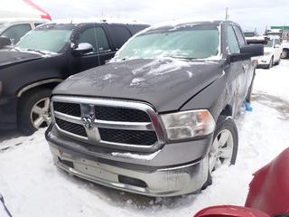 2014 Dodge Ram 1500 SLT 4X4 Crew Cab Pickup c/w 5.7L Hemi, A/T And P275/60R20. VIN 1C6RR7LT6ES320633 *Note: Missing Front End Axle, Windshield Cracked, Back Window Open, Flat Tires, Missing Tires Brakes/Front End Pieces, Inside Damaged, No Keys, Running Condition Unknown, Buyer Responsible For Removal* **Located In Fort McMurray**