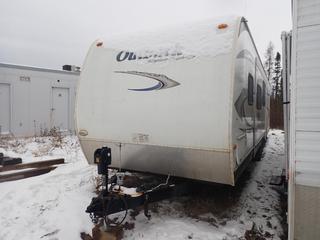 2011 Keystone Outback Super-Lite 312 BH T/A Bumper Pull Camper c/w 120V, 30A, 9000lb GVWR, (1) 6 1/2ft And (1) 12ft Slide, Bedroom, Bathroom, 2 5/16in Ball Hitch And ST225/75R15D Tires VIN 4YDT31220BB451099 *Note: Buyer Responsible For Removal* **Located In Fort McMurray**