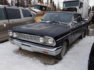 1964 Ford Fairlane 4-Door Sedan c/w 6-Cyl 300 Gas Engine, A/T, 6-Cyl And P215/70R14Tires. Showing 87,536 Miles. SN 054A64L060563 **Located In Fort McMurray**