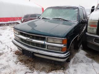 1999 Chevrolet Tahoe LS  SUV c/w 5.7L Vortec V8 And P235/75R15 Tires. Showing 289,597kms. VIN 1GNEC13R3XJ514093 *Note: Minor Rust, Windshield Cracked* **Located In Fort McMurray**