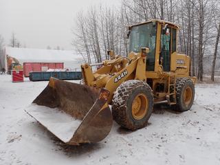 2000 John Deere 444H Front End Wheel Loader w/ John Deere 4045TDW50 4.5L 114HP Diesel, 3-Spd Powershift, John Deere 2.5yd Bucket, 3rd Valve, Cab And 17.5R25 Tires. Showing 2,960hrs. SN 574195  **Located In Fort McMurray**