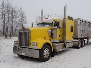 2022 Kenworth W900 T/A Sleeper Truck Tractor w/ Cummins X15 450HP 15.0L, Eaton-Fuller 15-Spd, 53,200lb GVWR, 13,200 Fronts, 40,000lb Rears, A/R Susp, 72in Studio Sleeper, 246in WB And 11R22.5 Tires. CVIP 08/2026. Showing 7,961hrs, 376,260 Kms. VIN 1XKWD49X2NR980053 *Note: Trailer Not Included* **Located In Fort McMurray**