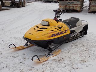 Bombardier Ski-Doo MXZ670HO Snowmobile w/ Rotax Gas And 16in Track. Showing 3091kms. *Note: Motor Seized, Unable To Verify VIN, Working Condition Unknown* **Located In Fort McMurray**