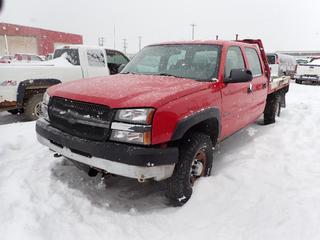 2004 Chevrolet Silverado 3500 4X4 Crew Cab Flat Deck c/w V8, A/T, 8ft X 6ft Deck And LT265/75R16 Tires. Showing 126,631kms. VIN 1GCHK33G54F238114 *Note: Rust, Scratches, Shifter Issues, Dents* *PL#63 **LOCATED @ 210 MACDONALD CRESCENT, FORT MCMURRAY, AB**