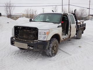2015 Ford F250 Super Duty 4X4 Crew Cab Flat Deck c/w 6.2L, A/T, 9ft X 7ft Deck, Reid Electric SP74 12/24V Battery Booster Jump Starter And LT265/70R17 Tires. Showing 172,003kms. VIN 1FD7W2B6XFEC05956 *Note: Driver Door, Front Grille And Radio Missing, Dash Apart, Rust, Fuel Leak* *PL#24 **LOCATED @ 210 MACDONALD CRESCENT, FORT MCMURRAY, AB**