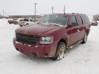 2007 Chevrolet Suburban SUV c/w V8, A/T And LT245/75R16 Tires. VIN 3GNGK26K67G151158 *Note: Rust, Dash Apart, Passenger Side Mirror Broken, Hole In Floor, Running Condition Unknown* PL#28 **LOCATED @ 210 MACDONALD CRESCENT, FORT MCMURRAY, AB**