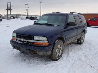 2003 Chevrolet Blazer 4X4 SUV c/w 4.3L, A/T And 235/75R15 Tires. Showing 106,109kms. VIN 1GNDT13X73K111183 *Note: Dash Damaged, Rust, Windshield Cracked, Runs Rough, Does Not Stay Running* PL#42 **LOCATED @ 210 MACDONALD CRESCENT, FORT MCMURRAY, AB**