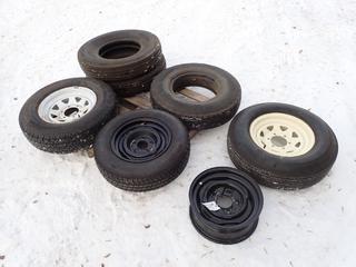 Qty Of (3) Bridgestone Radial 700.R15 LT Tires c/w (1) Goodyear ST225/75R15 Tire, (1) BF Goodrich Tire w/ 6-Bolt Rim, (1) Bridgestone P185/75 Tire w/ 5-Bolt Rim And (1) 5-Bolt Rim ** LOCATED IN EDMONTON**