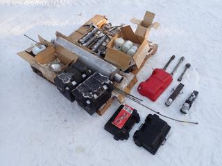 Qty Of Grease Guns, Muffler, Battery Boxes, Brake Lines, Ball Hitches, Lights, Oil Filters And Assorted Supplies **LOCATED IN EDMONTON**