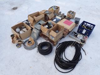Westing House AC Starter Box, Electrical Boxes, Switches, Face Plates, (2) Nova Line 120/240V Panel Boxes, 150W Flood Light And Assorted Supplies **LOCATED IN EDMONTON**