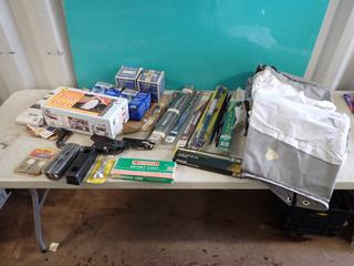 Qty Of Wiper Blades, Mega Clamps, Battery Cable, Door Handle, Sun Visor, Lights And Assorted Supplies **LOCATED IN EDMONTON**