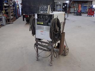 MEMCO S-250 230/460/575V Single Phase CC AC/DC Arc Welding Power Source c/w MEMCO Pulse GTAW 115V Single Phase Pulser Control, Qty Of Welding And Ground Cable, Regulator And Cart. SN KB042957 