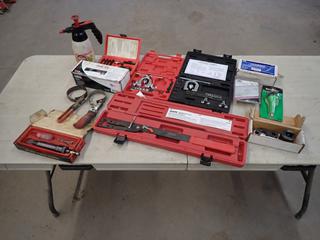 (2) Incomplete Double Flaring Tool Kit, K-D Tools Pully Remover And Installer Set, UV Phazer NEO High Input LED Light, (2) Oil Filter Wrench, Ford Oil Line Disconnect Tool, Chrysler LH Toe Adjusting Tool Set, Ford Clutch Coupling Tool And OEM Adjustable Fan Clutch Holding Tool