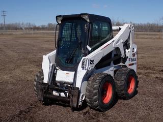 2014 Bobcat S650 Skid Steer Loader c/w Kubota V3307 3.3L Diesel Engine, 2-Spd, Q/A, Aux Hyd, ISO/H-Drive w/ Hand Bucket Steering Patterns And 12-16.5 Tires. Showing 4401hrs. PIN A3NV24274 **LOCATED IN COLD LAKE, AB**