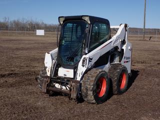 2014 Bobcat S570 Skid Steer Loader c/w Bobcat 2.4L Diesel Engine, 2-Spd, Q/A, Aux Hyd, H-Drive w/ Foot Bucket Steering And 12-16.5 Tires. Showing 4207hrs. PIN ALM412079 **LOCATED IN COLD LAKE, AB**