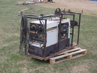 Hobart Champion 16 115/230V Single Phase 8000W AC/DC CC/CV Multi-Process Welder Generator c/w Onan Performer 16 Gas Engine, Skid, Ground And Welding Cable. Showing 579hrs. SN 296WR03395 **LOCATED IN EDMONTON**