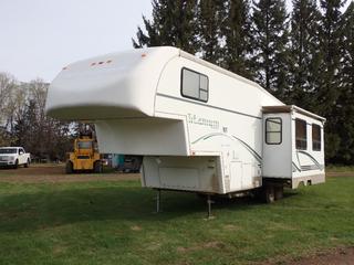 2003 Titanium Glendale Model 28E33 33ft T/A Holiday Trailer c/w 120V, 30A, (1) Bedroom, Bathroom, Fridge, Stove, Microwave, Outside Shower, Winter Package, 10,251lb GVWR And ST235/80R16 Tires. VIN 2GRFW28T13S034492 **LOCATED IN EDMONTON** 