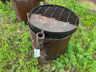 24in Steel Fire Pit C/w Swing Away Grill *Note: Buyer Responsible For Removal* **LOCATED NEAR COLD LAKE, AB FOR MORE INFO CONTACT KIRK @780-826-8558**