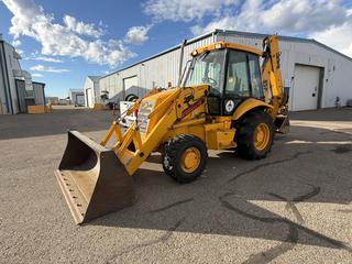 JCB 214 Series 3 Rubber Tire 4x4 Loader Backhoe C/w Diesel Eng, Pin On Front Bkt, A/C Cab, Rear Excavtor w/ Extend-a-hoe, Q/c Dig Bkt Unable To Confirm Hours VIN SLP214TCYU0900044 **Located @ Fort McMurray Airport**