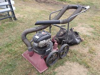 Minuteman Parker LV02675BF Vacuum c/w Briggs & Stratton 6.75hp Engine, Hose And Bag. SN ALV02675BF0819 *Note: Working Condition Unknown* **Located Near Redwater, AB**