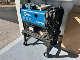 Miller Blue Star 185 CC/DC Engine-Driven Welder/Generator, 6,000 Watt Generator, 185 Amp Max Weld Output, c/w Welding Leads, Electrode Holders, Ground Cables, Welding Rods & Mobile Steel Cart