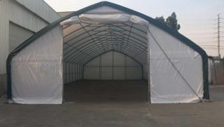 Unused 30'x70'x16' Straight Wall Peak Shelter c/w Commercial Fabric, Waterproof, UV, Fire Resistant, 13'x13' Drive Through Door.